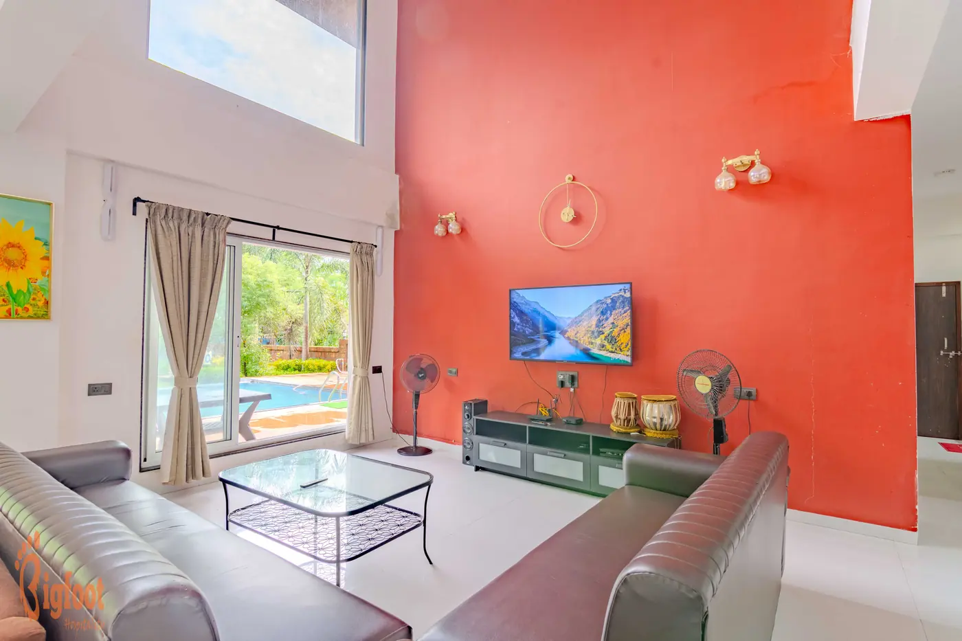 Living hall at Hideaway Villa looking out towards the swimming pool